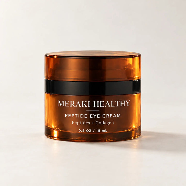 Crema para contorno de ojos Meraki Healthy con péptidos y colágeno, frasco ámbar de 15 mL sobre arena iluminada por el sol.

Meraki Healthy Peptide Eye Cream with Collagen, 15 mL amber skincare jar displayed on sunlit sand.