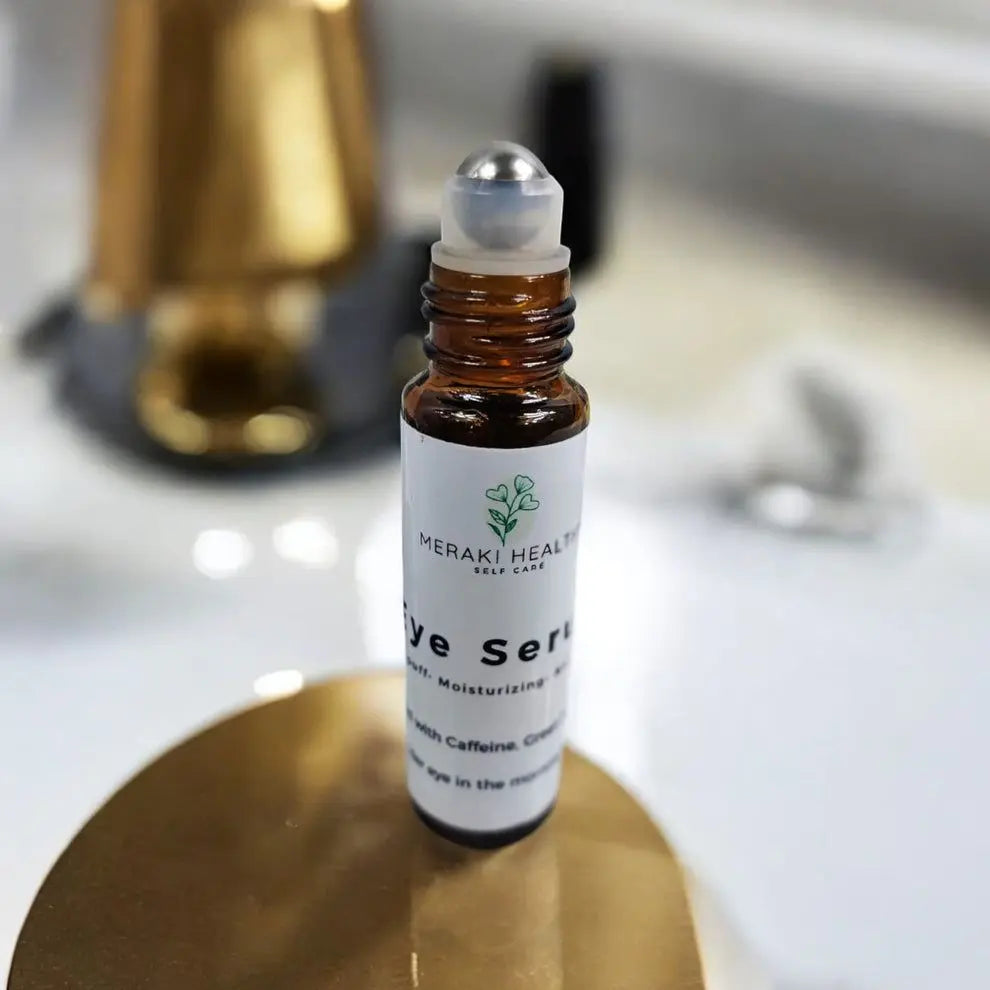“Close-up of Meraki Healthy Anti-Aging Eye Serum texture — a silky botanical blend that nourishes delicate skin, minimizes puffiness, and brightens dark circles for healthy, radiant eyes.”